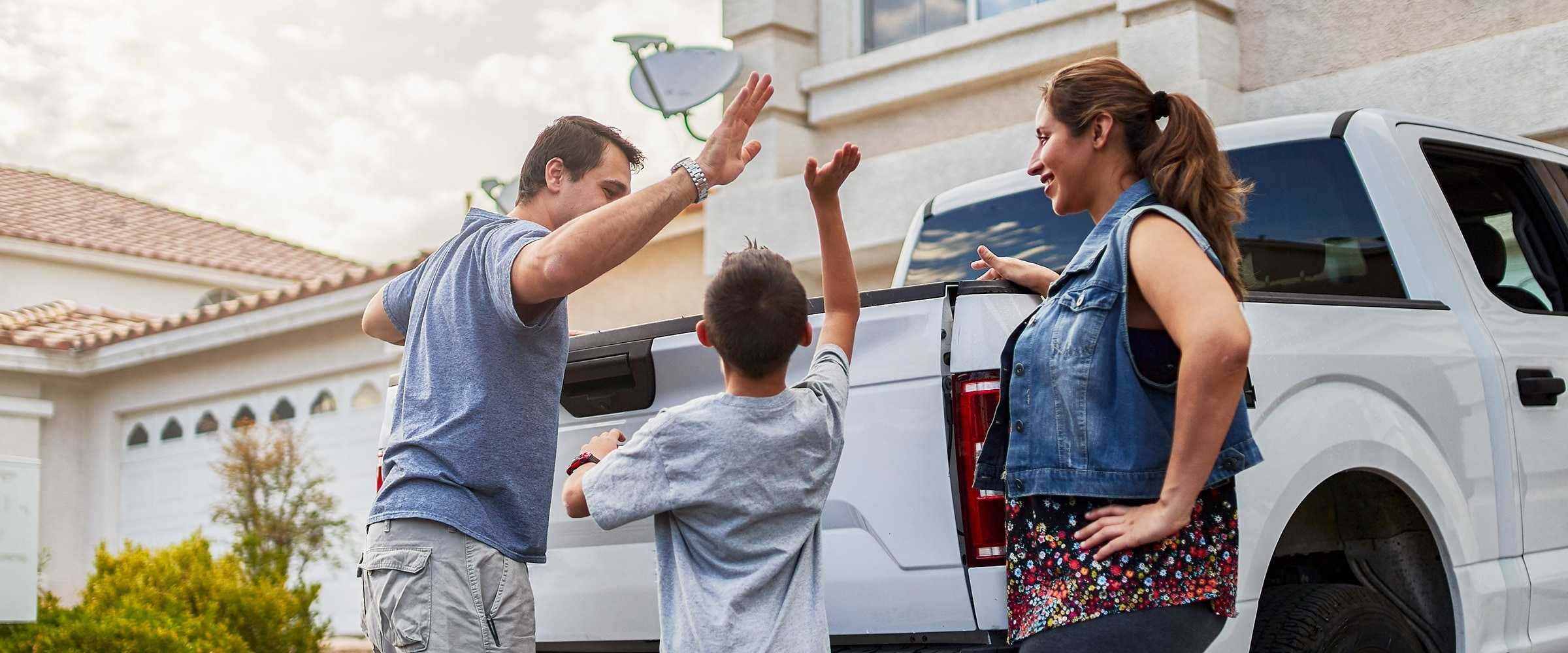 Family and the truck in the driveway