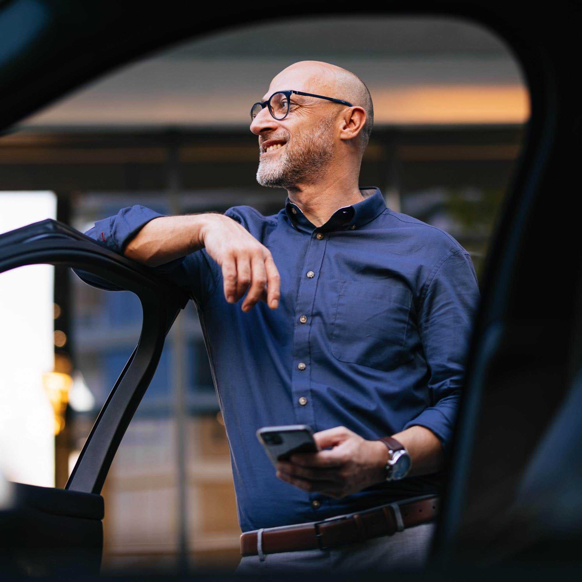 Man standing by The Car - Oshawa