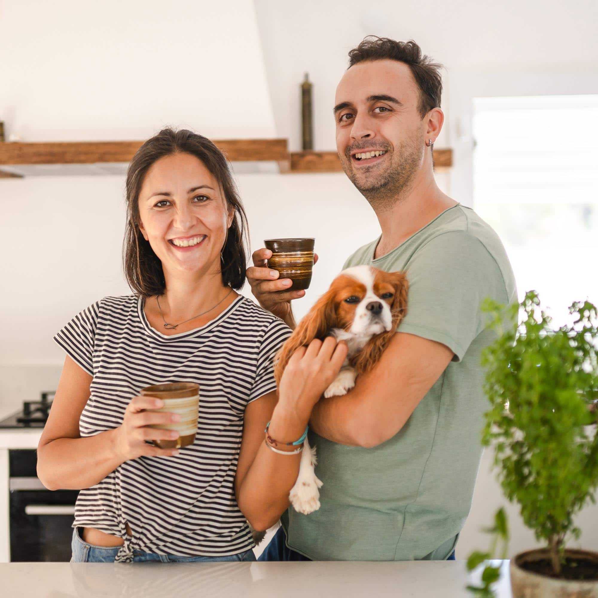 Couple with the dog in The Home - Newfoundland