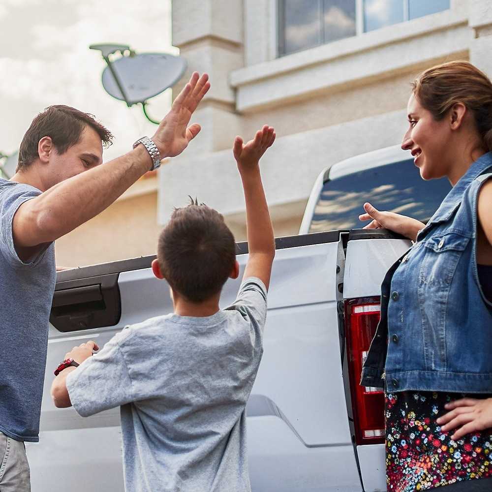 Family and the truck in the driveway