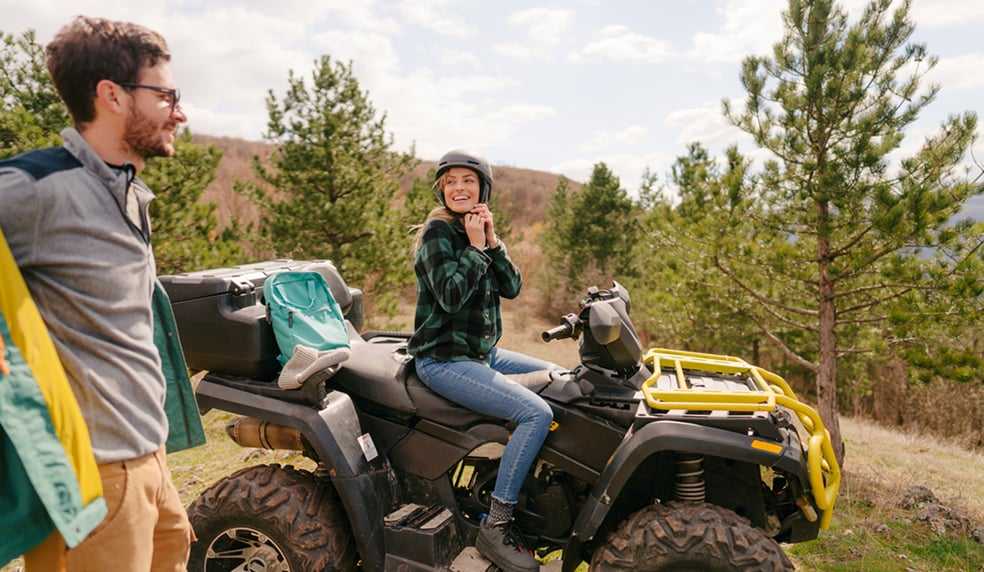 Couple with the ATV