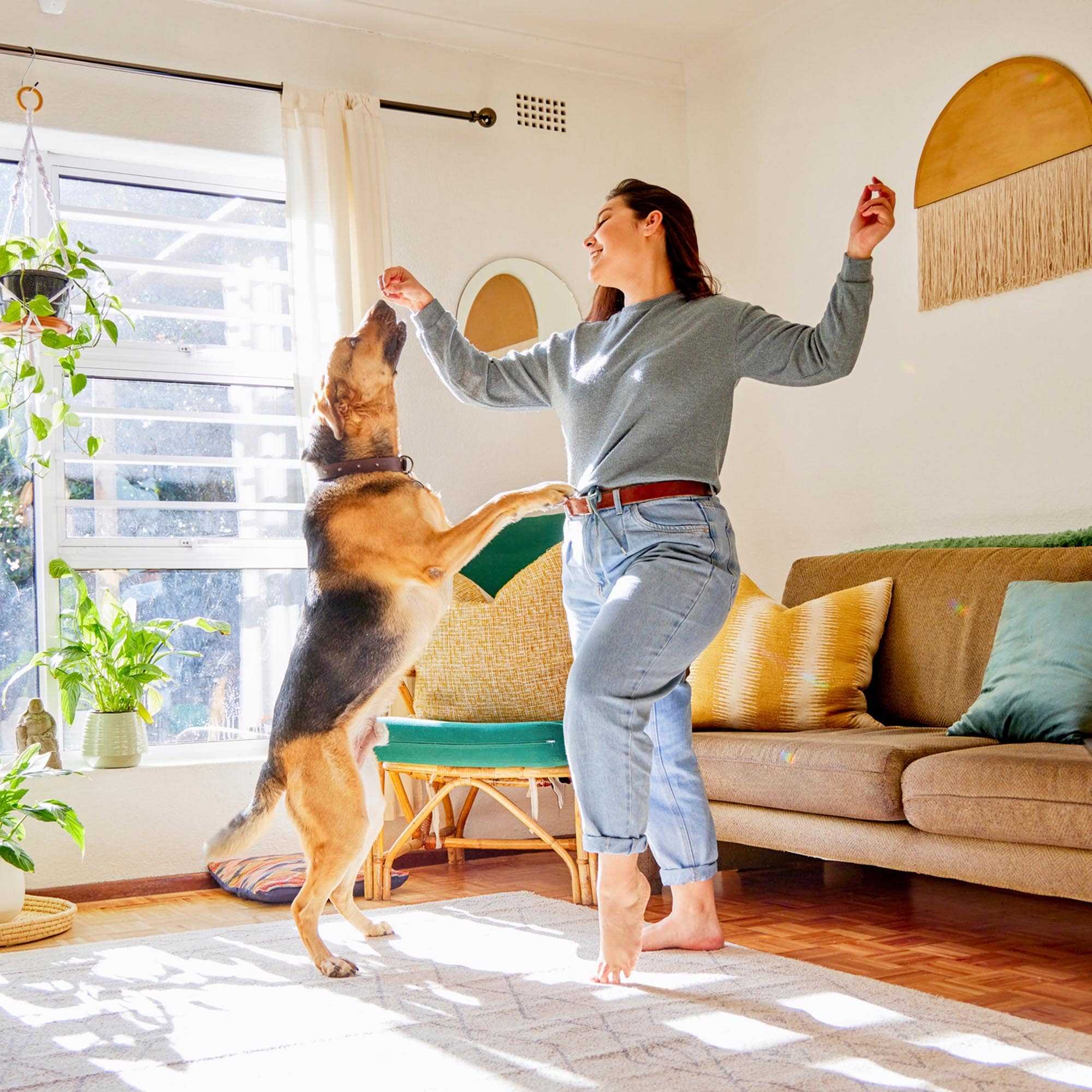 Lady Dancing with a Dog in The Home - Kitchener